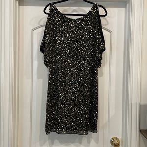 Sequence dress, black fabric with gold sequence.